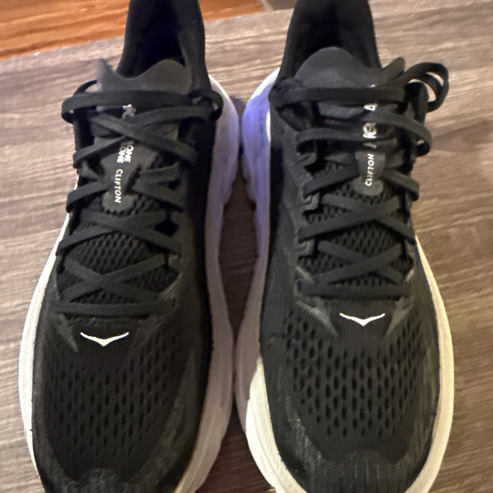 Hoka women’s  Black and White Athletic Shoes